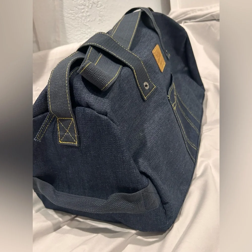 Jean Paul Gaultier pour Vous denim weekend duffel bag with adjustable strap